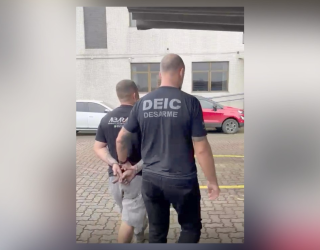 Pol�cia prende suspeito de fornecer fuzis para a Rocinha