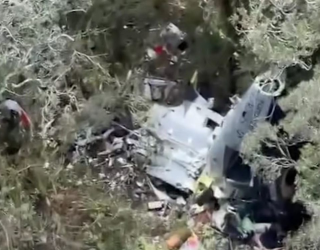 Destro�os do helic�ptero do cantor Rick s�o encontrados em serra catarinense